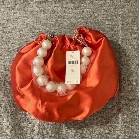 Anthropologie Handbags - Anthropologie Scrunched Pearl Mini Bag. NWT